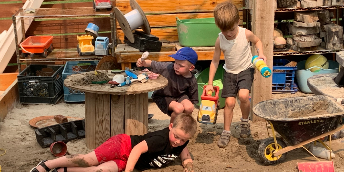 Children exploring nature during summer camp